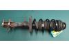 Front shock absorber rod, right from a Opel Corsa D 1.3 CDTi 16V ecoFLEX 2011