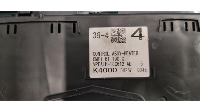 Heater control panel from a Mazda CX-3 2.0 SkyActiv-G 155 AWD 2015