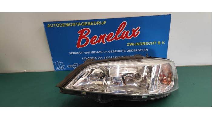 Używane Reflektor lewy Opel Astra G Caravan (F35) 1.6 16V Cena na żądanie oferowane przez Benelux Zwijndrecht B.V.