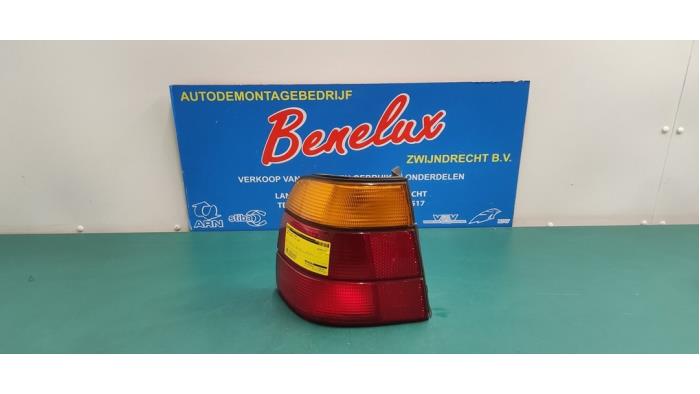 Taillight, left from a BMW 5 serie Touring (E34) 520i 24V 1993