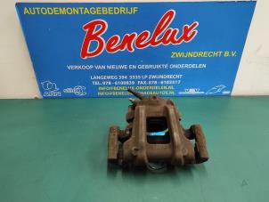Used Front brake calliper, left BMW 1 serie (F20) 118i 1.6 16V Price on request offered by Benelux Zwijndrecht B.V.