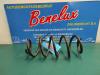 Rear coil spring from a Toyota Yaris III (P13) 1.5 16V Hybrid 2013