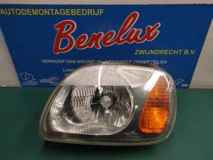 Używane Reflektor lewy Nissan Micra (K11) 1.0 16V Cena na żądanie oferowane przez Benelux Zwijndrecht B.V.