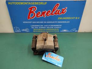 Used Front brake calliper, left Toyota Prius (ZVW3) 1.8 16V Price on request offered by Benelux Zwijndrecht B.V.