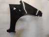 Front wing, right from a Mitsubishi Colt (Z2/Z3) 1.3 16V 2007