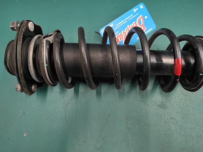 Front shock absorber rod, left from a Mitsubishi Space Star (A0) 1.2 12V 2021