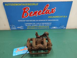 Used Rear brake calliper, left Opel Astra J (PC6/PD6/PE6/PF6) 1.6 16V Ecotec Price on request offered by Benelux Zwijndrecht B.V.