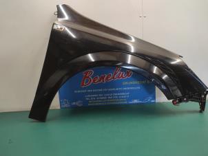 Used Front wing, right Opel Astra H SW (L35) 1.6 16V Twinport Price on request offered by Benelux Zwijndrecht B.V.