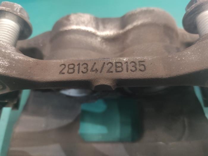 Front brake calliper, left from a Ford Transit Custom 2.0 TDCi 16V Eco Blue 130 2021