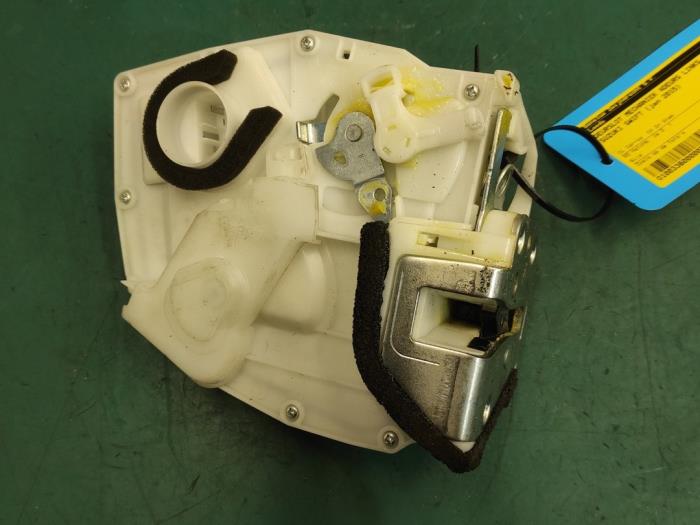 Rear door lock mechanism 4-door, left from a Suzuki Swift (ZA/ZC/ZD) 1.2 16_ 2015
