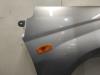 Front wing, right from a Daihatsu Cuore (L251/271/276) 1.0 12V DVVT 2005