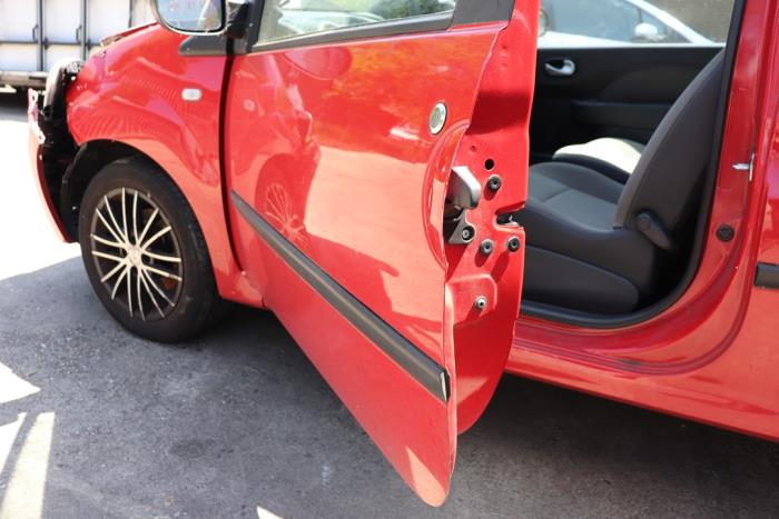 Renault Twingo II left front door open showing hinge mounting area