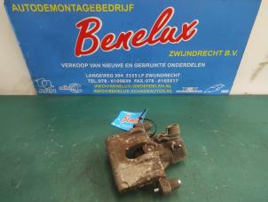 Used Rear brake calliper, left Ford Focus 2 Wagon 1.6 16V Price on request offered by Benelux Zwijndrecht B.V.