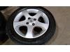 Set of wheels + tyres from a Suzuki Swift (ZA/ZC/ZD1/2/3/9) 1.3 VVT 16V 2005
