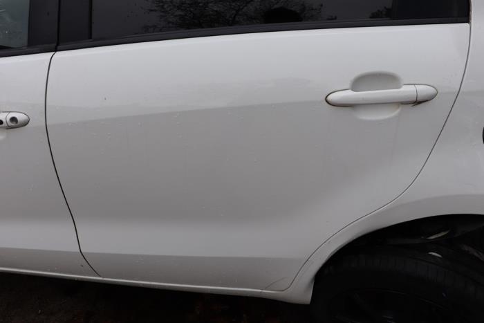 Rear door 4-door, left from a Kia Rio III (UB) 1.2 CVVT 16V 2012