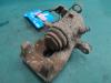 Rear brake calliper, left from a Opel Astra H SW (L35) 1.6 16V Twinport 2006
