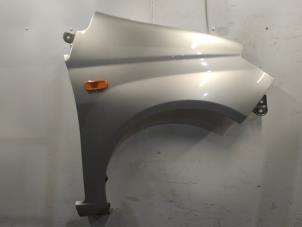 Used Front wing, right Daihatsu Cuore (L251/271/276) 1.0 12V DVVT Price on request offered by Benelux Zwijndrecht B.V.