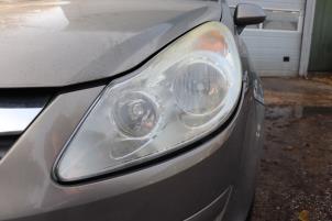 Used Headlight, left Opel Corsa D 1.4 16V Twinport Price on request offered by Benelux Zwijndrecht B.V.