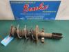 Front shock absorber rod, left from a Renault Clio III Estate/Grandtour (KR) 1.5 dCi FAP 2012
