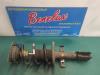 Front shock absorber rod, left from a Renault Clio III (BR/CR) 1.5 dCi FAP 2012