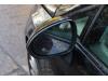 Wing mirror, left from a Seat Ibiza ST (6J8) 1.2 TDI Ecomotive 2012