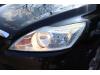 Headlight, left from a Ford Focus 2 Wagon 1.6 TDCi 16V 110 2009