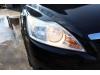 Headlight, right from a Ford Focus 2 Wagon 1.6 TDCi 16V 110 2009