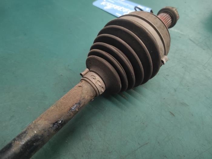 Front drive shaft, left from a Honda Civic (FA/FD) 1.3 Hybrid 2011