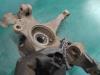 Knuckle, front left from a Opel Corsa D 1.2 16V 2010