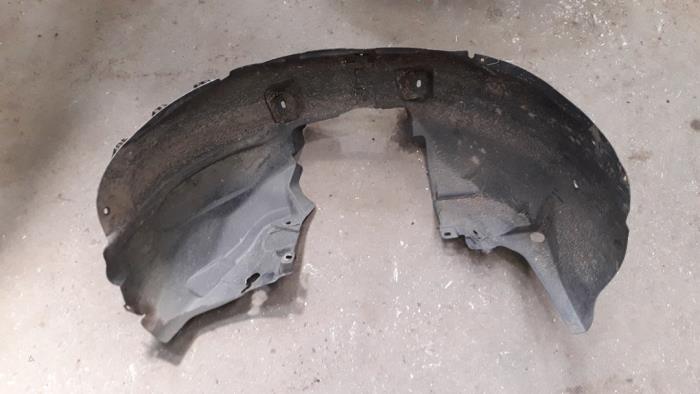 Wheel arch liner from a Opel Corsa B (73/78/79) 1.2i 16V 2000