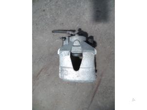 Used Front brake calliper, right Volkswagen Up! (121) 1.0 12V 75 Price on request offered by Autodemontage Joko B.V.