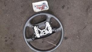 Used Steering wheel Mazda Demio (DW) 1.3 16V Price on request offered by Autodemontage Joko B.V.