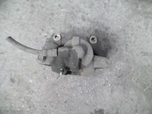 Used Front brake calliper, right Opel Corsa D 1.4 16V Twinport Price on request offered by Autodemontage Joko B.V.