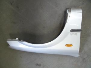 Used Front wing, right Mazda 323 (BJ12) 1.3i 16V Price on request offered by Autodemontage Joko B.V.