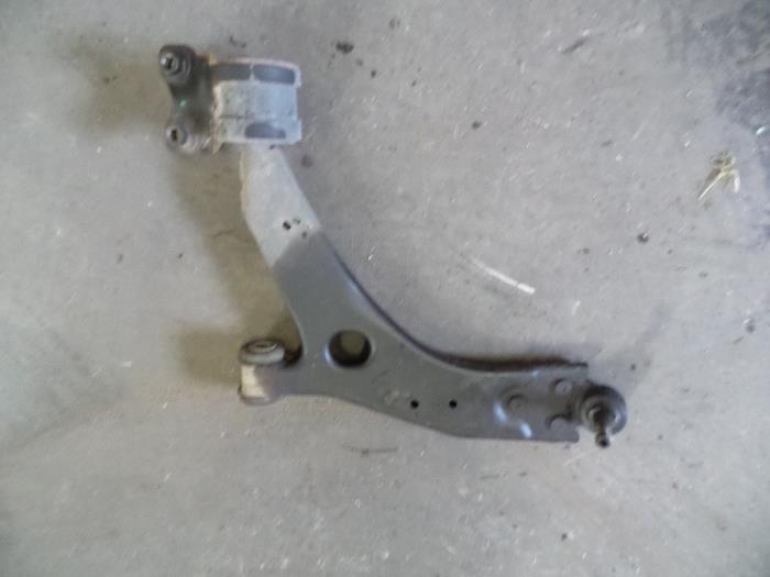 Front lower wishbone, left from a Ford Focus 2 1.4 16V 2006