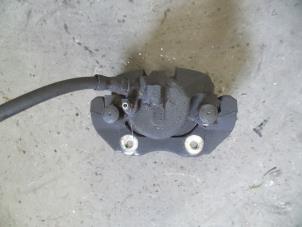 Used Front brake calliper, left Ford Focus 2 1.4 16V Price on request offered by Autodemontage Joko B.V.