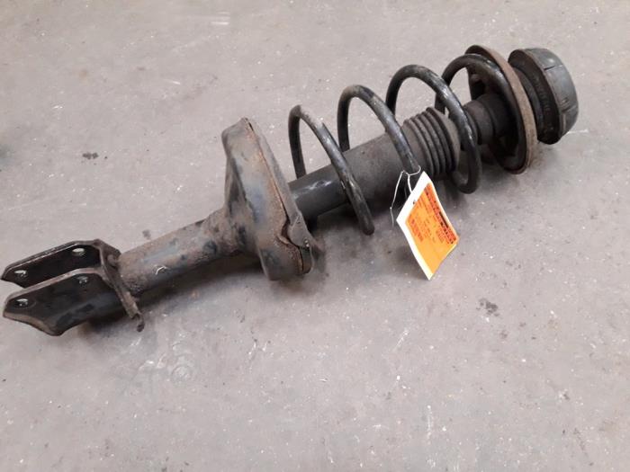 Front shock absorber rod, left from a Renault Clio II (BB/CB) 1.4 16V 2003