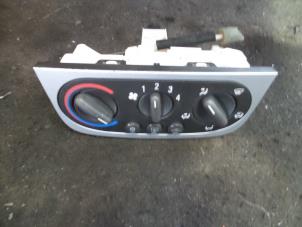 Usados Panel de control de calefacción Opel Tigra Twin Top 1.4 16V Precio de solicitud ofrecido por Autodemontage Joko B.V.
