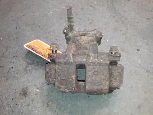 Used Front brake calliper, left Daihatsu Terios (J1) 1.3 16V 4x4 Price on request offered by Autodemontage Joko B.V.