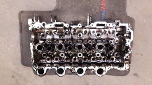 Used Cylinder head Peugeot 207/207+ (WA/WC/WM) 1.6 HDi 16V Price on request offered by Autodemontage Joko B.V.