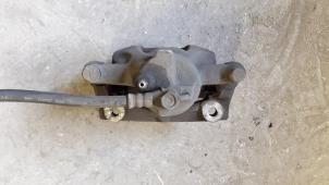Used Front brake calliper, left Toyota Aygo (B10) 1.4 HDI Price on request offered by Autodemontage Joko B.V.