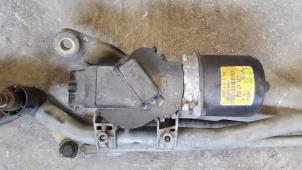 Used Front wiper motor Nissan Almera (N16) 1.5 dCi Price on request offered by Autodemontage Joko B.V.