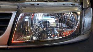 Używane Reflektor lewy Mitsubishi Space Runner (N1/N2) 1.8 GLi 16V Cena na żądanie oferowane przez Autodemontage Joko B.V.