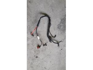 Used Wiring harness Opel Astra H SW (L35) 1.9 CDTi 16V 120 Price on request offered by Autodemontage Joko B.V.