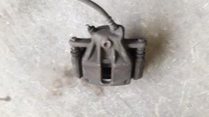 Used Front brake calliper, right Renault Clio III (BR/CR) 1.5 dCi 70 Price on request offered by Autodemontage Joko B.V.