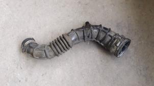 Used Air intake hose Renault Clio III (BR/CR) 1.5 dCi 70 Price on request offered by Autodemontage Joko B.V.