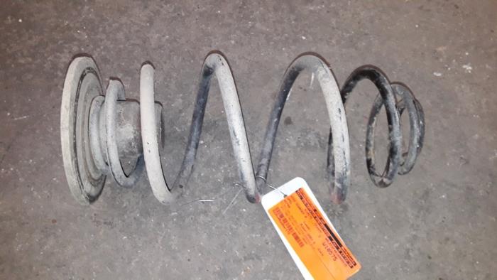 Rear coil spring from a Opel Astra G (F08/48) 1.4 16V 2001