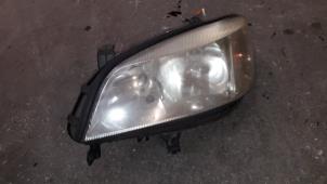Used Headlight, left Opel Zafira (F75) 1.6 16V Price on request offered by Autodemontage Joko B.V.