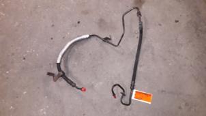 Used Power steering line Ford Focus 1 1.8 TDCi 100 Price on request offered by Autodemontage Joko B.V.