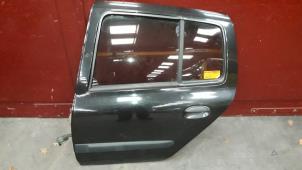 Used Rear door 4-door, left Renault Clio II Societe (SB) 1.5 dCi 68 Price on request offered by Autodemontage Joko B.V.